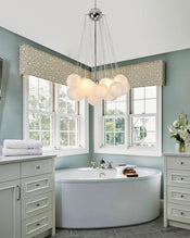 Large bubble chandelier over bathtub